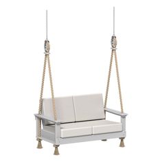 a white couch sitting on top of a swing