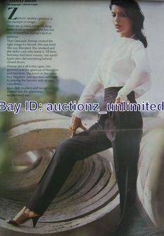 an advertisement for bay d auctionz is shown in front of a woman's face