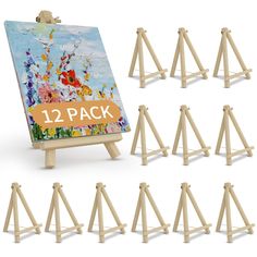 twelve wooden eases with 12 paintings on each side and the number one in front