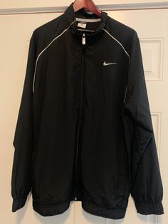 Men's Nike Dri Fit full zip track jacket in black, size XL. New with tags. Nylon outer, lined inside. MSRP $70.00 Mens Fashion Nike, Vintage Nike Jacket, European Fashion Summer, Nike Track Jacket, Fits Men, Striped Jacket, Really Cute Outfits, Workout Jacket, Casual Style Outfits