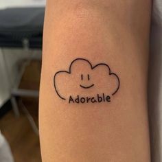 a tattoo with the word adorable written on it