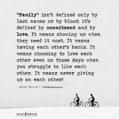 two people riding bikes in the snow with a quote about family isn't defined only by last names or by blood