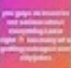 blurry image of an orange and pink background