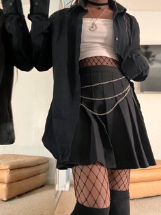 Person wearing fishnet tights with black flowy  skirt. White cropped t-shirt and oversized black button up. With three layered chain around hips. With black chicken that has a ball and moon necklace. And black knee socks Cute Outfits Black And White, White And Black Goth Outfit, Aesthetic Black And White Clothes, Black And White Emo Outfits, Black N White Outfits, Black And White Alt Outfits, White And Black Clothes, Black And White Scene Outfit, Black And White Clothes Aesthetic