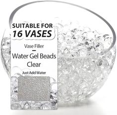 a clear glass bowl filled with water beads and an ad for 16 vases on the side