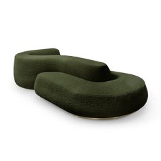 two green couches sitting next to each other