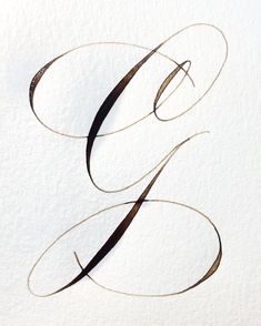 the letter e is made up of two thin lines and has been drawn with ink