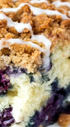 a piece of blueberry crumb cake on a plate