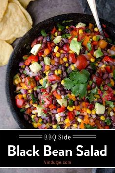 black bean salad with avocado and cilantro in a bowl