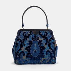 Burnout Velvet Navy Alma Shoulder Bag Carpet Bag of America front Luxury Baguette Bag With Handles For Travel, Luxury Travel Baguette Bag With Handles, Travel Tote Baguette Bag With Detachable Handle, Elegant Blue Baguette Bag With Removable Pouch, Elegant Blue Baguette Bag With Detachable Strap, Elegant Blue Baguette Bag With Top Handle, Elegant Blue Baguette Bag For Evening, Evening Satchel Bag With Dust Bag Included, Evening Satchel With Dust Bag Included