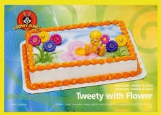 an advertisement for winnie the pooh birthday cake with flowers on it and two little ducks