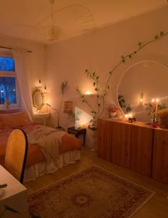 a bed room with a neatly made bed next to a window and a rug on the floor