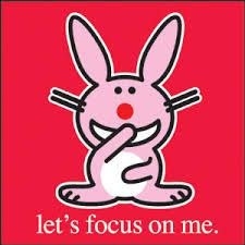 an image of a pink bunny with the words let's focus on me written below it