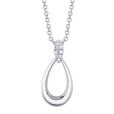 This pendant features a beautiful open teardrop design crafted in 14K white gold. It is adorned with a diamond bail and comes with a chain. Perfect for adding a touch of elegance to any outfit. Luxury Solitaire Teardrop Jewelry, Luxury White Teardrop Solitaire Necklace, Fine Jewelry White Gold Teardrop Diamond Necklace, Brilliant Cut Teardrop Diamond Necklace, White Gold Teardrop Pendant Necklace With Diamond Cut, Silver Teardrop Pendant Diamond Necklace, White Gold Teardrop Pendant Drop Necklace, Teardrop Diamond Necklace, Diamond Pendants