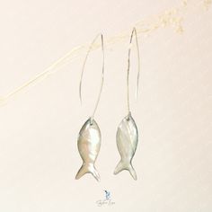 These unique fish dangle drop earrings feature a mother of pearl shell fish shape charm on 925 sterling silver fish hook earrings, the unique fish bait look design and shell material make them look realistic and fun to wear. The fish shape shell charms have unique texture and color translucence. 925 sterling silver ear hooks are safe for skin. Jewelry Care: See more information about how to care for your jewelry here. Shipping Policy: Orders will be shipped within 1-3 business days. Economy shipping will take 7-14 days to arrive and standard shipping is 1- 4 days for U.S. orders. International shipping time is depended on the country and per shipping method. Shipping cost will be calculated at check out.For more details, see our Shipping Policy. Return Policy: Free return within 30 days fr Fish On Hook, Shell Fish, Unique Fish, Fish Bait, Fish Earrings, Fish Jewelry, Silver Fish, Fish Hook Earrings, Funky Jewelry