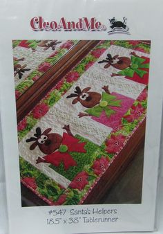 an advertisement for a quilted table runner in the shape of a teddy bear and reindeer