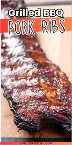 grilled bbq pork ribs on a cutting board with text overlay that reads grilled bbq pork ribs