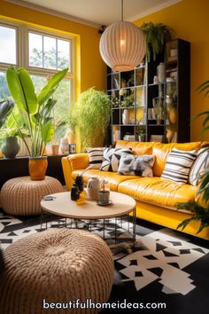 a living room filled with lots of furniture next to a large window and potted plants