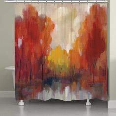 a shower curtain with an abstract painting of trees and water in autumn colors on it