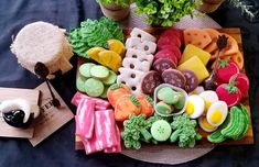 an assortment of cookies and pastries on a platter