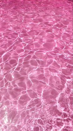 the pink water is reflecting light on it's surface