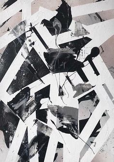 an abstract painting with black and white paint on it's surface, including strips of paper that have been torn off