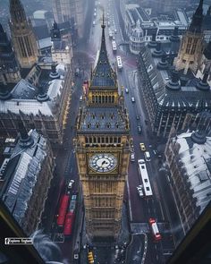 the big ben clock tower towering over the city of london in england, seen from above