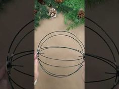 three pictures showing how to make a wire ball ornament for christmas tree ornaments