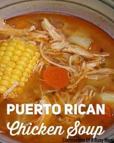 a close up of a bowl of soup with corn on the cob