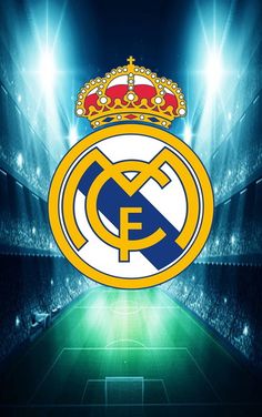 the real madrid crest is shown in front of an empty soccer field with bright lights