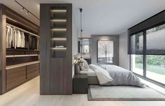 a bedroom with an open closet and bed