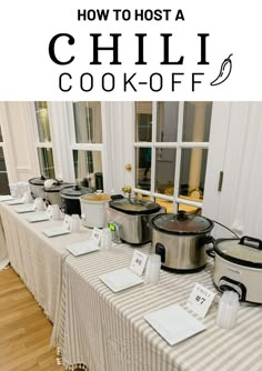 the table is set up with several crock - pot and rice cookers on it