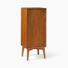 a wooden cabinet with two legs and a door on one side, against a white background