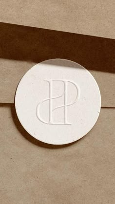 a white paper with the letter p on it