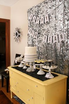 an image of a birthday party with cake and decorations