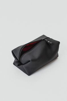 Leather MakeUp bag L: - dimensions: 19.5 (L) x 10.5 (W) x 9(H) cm; - made of natural leather; - with red lining; - closed with zipper. This black leather cosmetic case is great for keeping all your necessities organized. Looking for something smaller? Check this out: https://www.etsy.com/listing/735202640/minimalist-cosmetic-bag-leather-makeup?ref=listings_manager_grid Since 2015 SJgoodsLT bags have been produced by hand using old craft methods and modern technology.  Exclusive attention to details and comfort, no compromise on the quality of materials and style that matches the lifestyle of a modern city dweller - that's how SJgoodsLT stories are being created. This leather  belt bag/ crossbody bag was artisan made in Vilnius, Lithuania.  The Leather: we work with different kinds of leath Leather Cosmetic Bag, Leather Makeup Bag, Bag Minimalist, Leather Toiletry Bag, Leather Belt Bag, Toiletry Storage, Toiletry Bag Travel, Makeup Pouch, Cosmetic Pouch