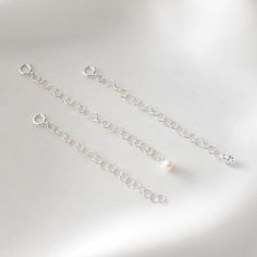 Add 2 inches to any of your necklaces using this interchangeable extension chain. Perfect for achieving the perfect length for layering necklaces. Made of sterling silver materials with freshwater pearl or cubic zirconia accents. --------------------♥ PROMOS ♥-------------------- Want 10% off? Join the mailing list by visiting http://bit.ly/vedern . Your discount code will work on Vedern at Etsy. --------------------♥ BUY WITH CONFIDENCE ♥-------------------- Don't love it? Message me to set up Layering Necklaces, Necklace Extender, Mailing List, Gold Filled Jewelry, Steel Jewelry, Sterling Silver Necklace, Discount Code, Layered Necklaces, Jewelry Care