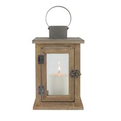 a wooden lantern with a lit candle inside