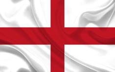 the flag of england is waving in the wind