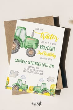 a green tractor birthday party card on top of a brown envelope