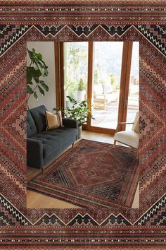 a living room filled with furniture and a large rug