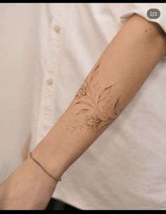 a person with a tattoo on their arm