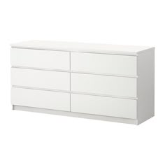 a white dresser with four drawers and two doors