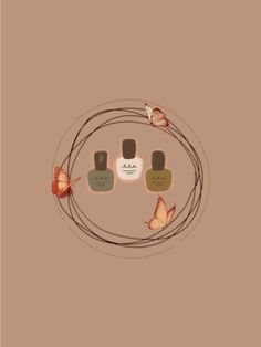 three bottles are sitting in the middle of a circle with butterflies around them on a brown background