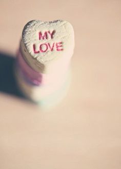 a heart shaped candy with the words my love written on it