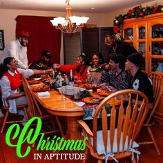 a group of people sitting around a wooden table