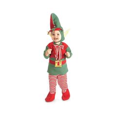 a toddler dressed in an elf costume