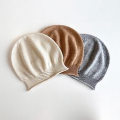 Paris Cashmere Beret effortlessly encapsulates the essence of a timeless Parisian style, exuding an elegance and sophistication. Crafted from Grade A Mongolian cashmere, it embraces your head with a soft, insulating embrace that shields you from chilly winds and wintry weather. It is your trusted companion in both fashion and comfort. Comes in three essential colours: Cream, Camel Melange and Grey Melange.  Designed in Portugal. Crafted in Inner Mongolia. Material: 100% Grade A Mongolian Cashmere  Care Instruction:  To achieve the best result, we recommend hand wash in cold water. Avoid bleach and fabric softeners. Lay flat to dry after washing and use low heat ironing. Use our CHEEKY GOATS complimentary cashmere comb to remove pills when necessary.  Knit Type: 7GG Plain Knit Elegant Knitted Hats For Winter, Classic Winter Beret One Size, Elegant Winter Hat One Size, Elegant Wool Beret Cap, Elegant One-size-fits-most Bonnet, Elegant Beret Cap For Fall, Elegant Flat Cap, One Size Fits Most, Elegant One-size Flat Cap, Elegant One Size Fits Most Flat Cap