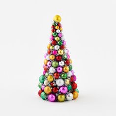 a christmas tree made out of ornaments on a white background