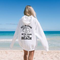 Our Get In Loser We're Going To The Beach Oversized Hoodie is the missing piece to your perfect Coconut Girl aesthetic. Crafted with comfy materials, it's perfect for snuggling up for a beach sunset or strutting your style down the boardwalk. Preppy, cozy, and Instagrammable, this sunkissed sweatshirt is your new VSCO must-have. Add a dash of beach to your wardrobe today! Summer Casual Hoodie With Letter Print, Casual Summer Hoodie With Letter Print, Cotton Relaxed Fit Hoodie For Vacation, Beach Hoodie With Letter Print, Summer Vacation Hoodie With Letter Print, Beach Season Sweatshirt With Letter Print, Vacation Cotton Hoodie With Letter Print, Casual Vacation Hoodie With Letter Print, Summer Letter Print Hoodie With Crew Neck